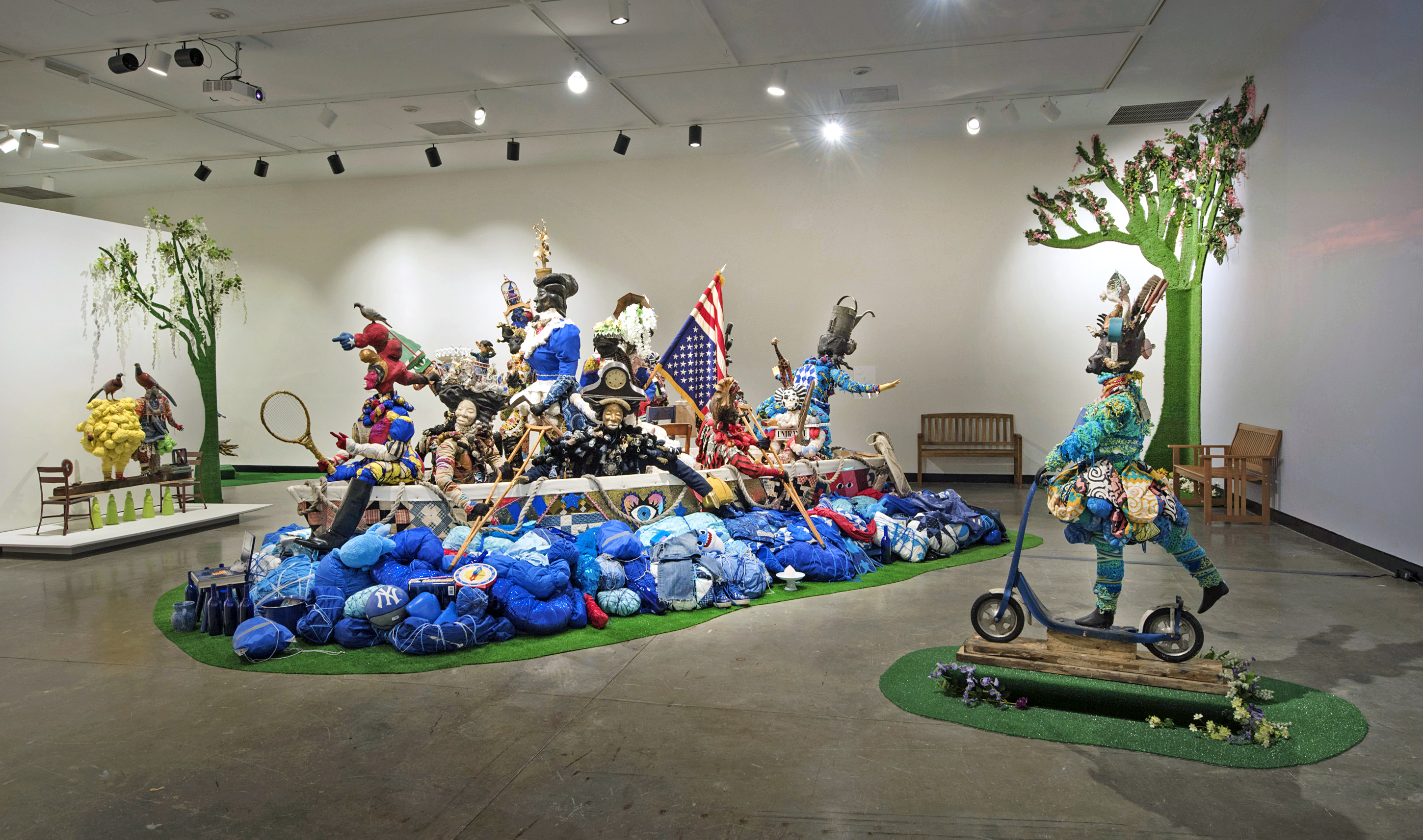 vanessa german, Installation view including "Miracles and Glory Abound" (2018) and "oh for the healing of the blues" (2016), 2023. Mixed-media assemblages. Dimensions variable. Montclair Art Museum. Photo by Peter Jacobs. 