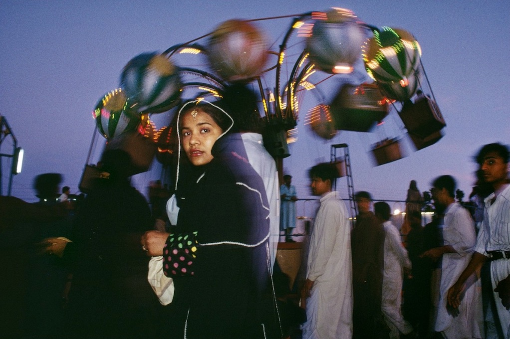 Karachi, Pakistan, 1998  Sightseers visit the colorful Clifton Beach Amusement Park in Karachi. © Ed Kashi