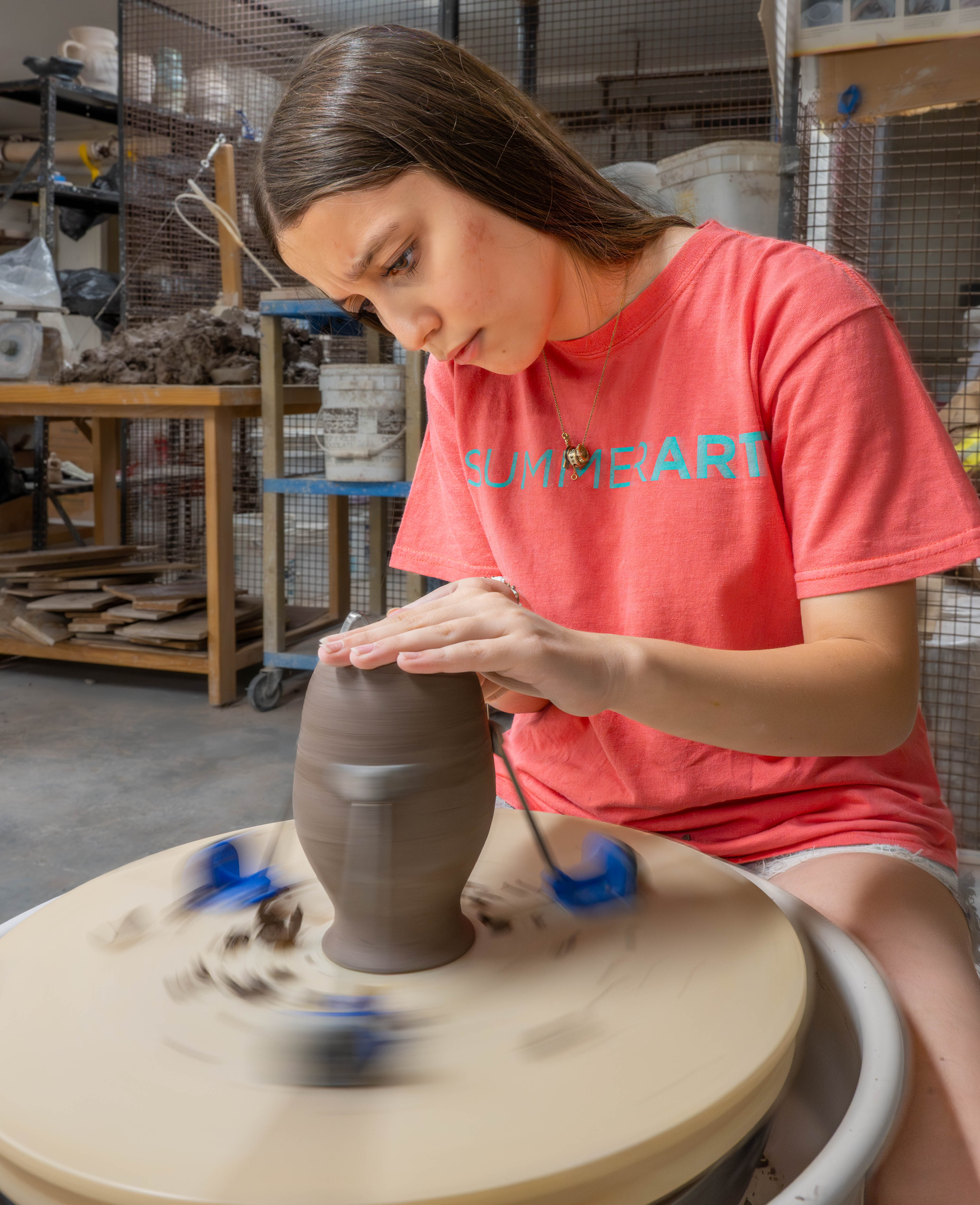 Teen trimming pottery