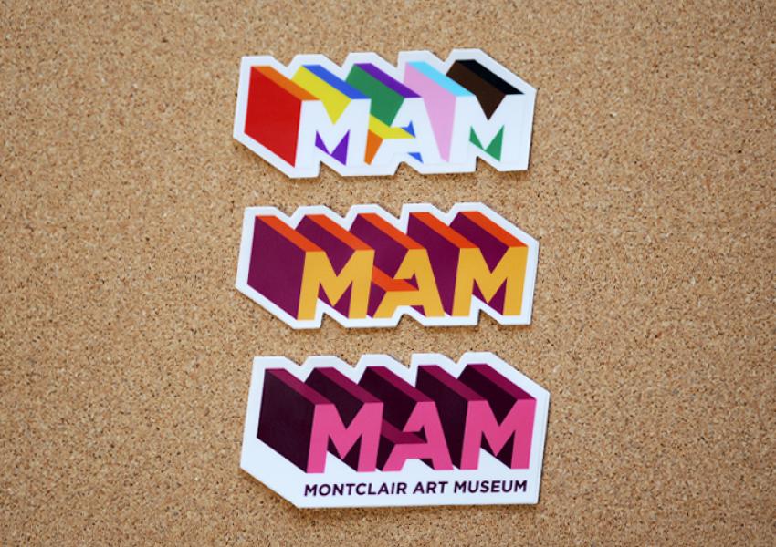 Three MAM Stickers in a row with different color patterns (Top is rainbow, Middle is Orange, and Botton is Magenta)