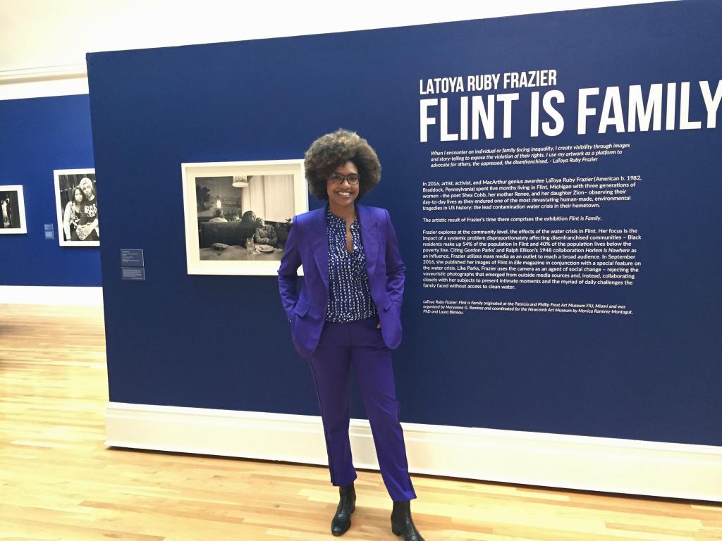 LaToya Ruby Frazier in front of intro panel for her exhibition of photo essay Flint is Family.