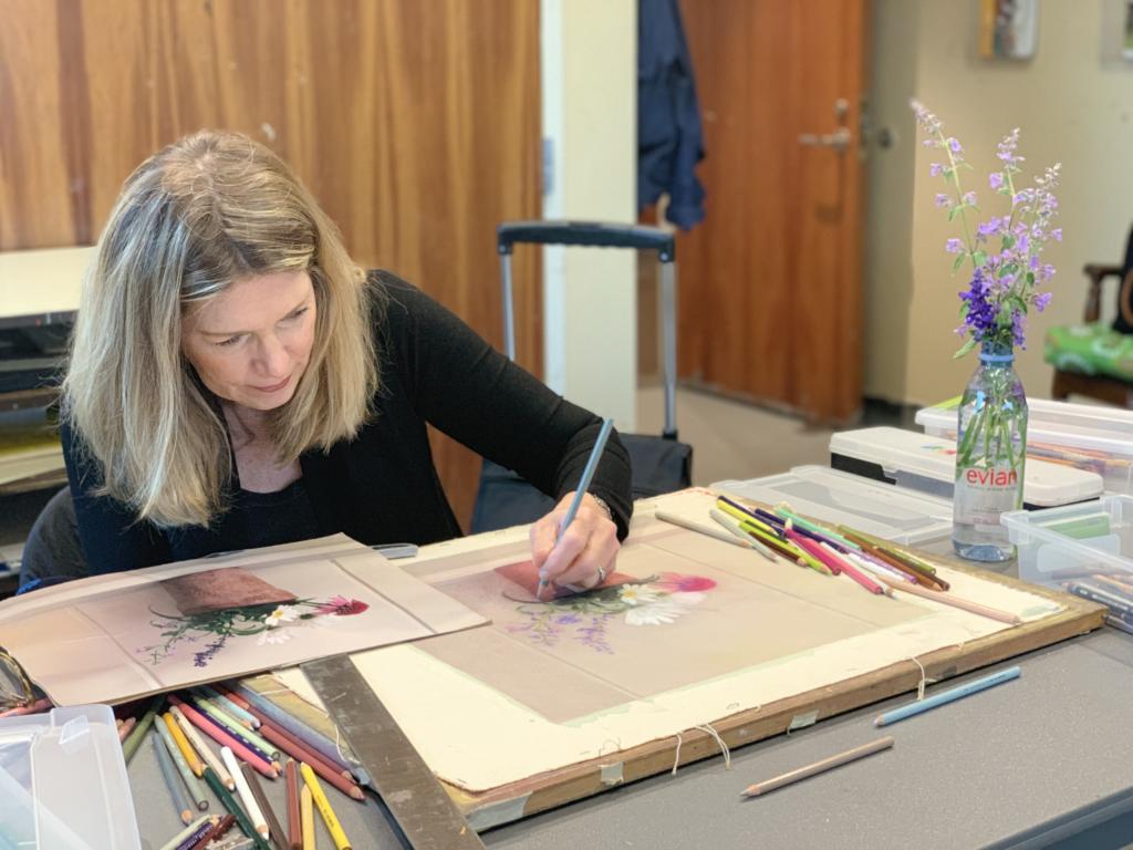 Adult student drawing a pot of flowers