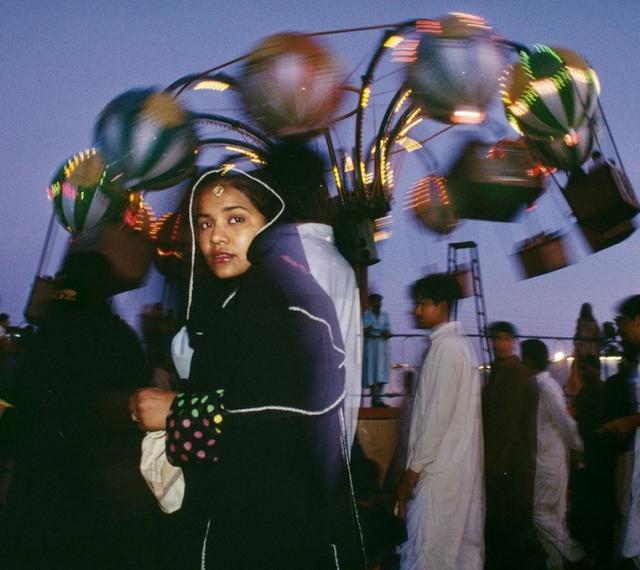 Karachi, Pakistan, 1998  Sightseers visit the colorful Clifton Beach Amusement Park in Karachi. © Ed Kashi