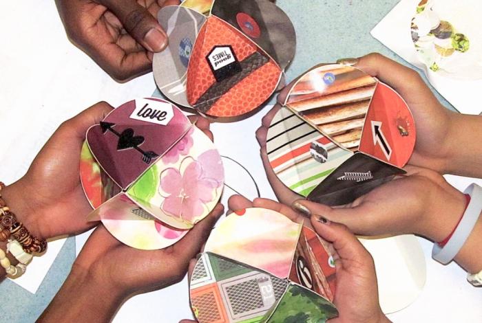 Example of round, eight-sided paper sculptures made of colorful marketing materials.